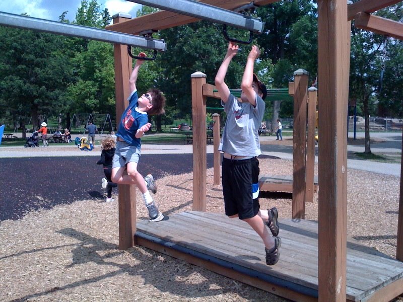 My sons enjoying playground equipment at Victoria Park