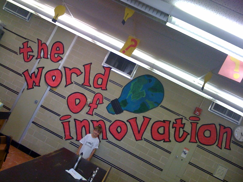 A banner at ESQ camp: ‘The World of Innovation’