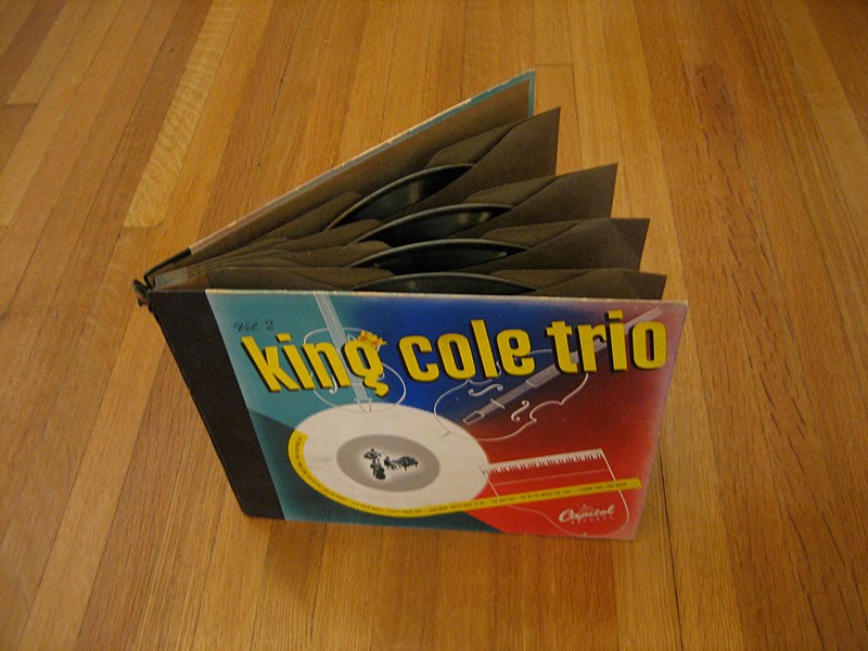 A book-like 78 RPM album of music by Nat King Cole