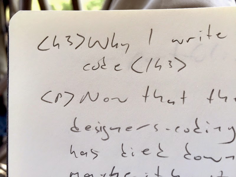 A closeup of hand-written code in a notebook