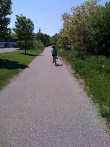 A cyclist riding on the Iron Horse Trail