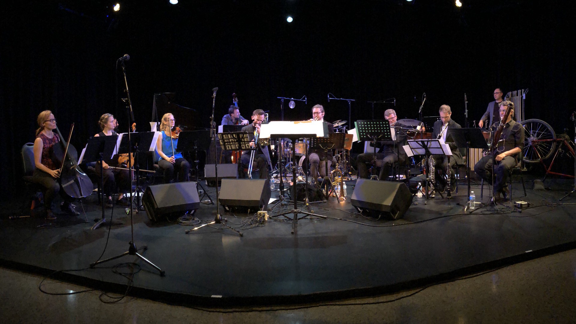 A stage filled with the musicians of Studio Dan
